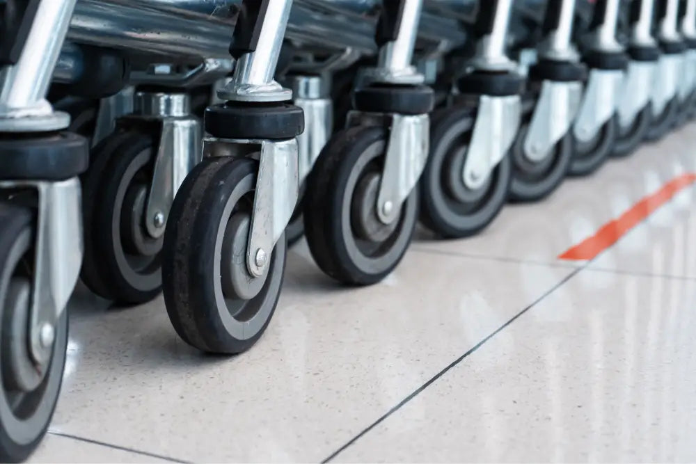 Row of wheeled carts lined up in a row